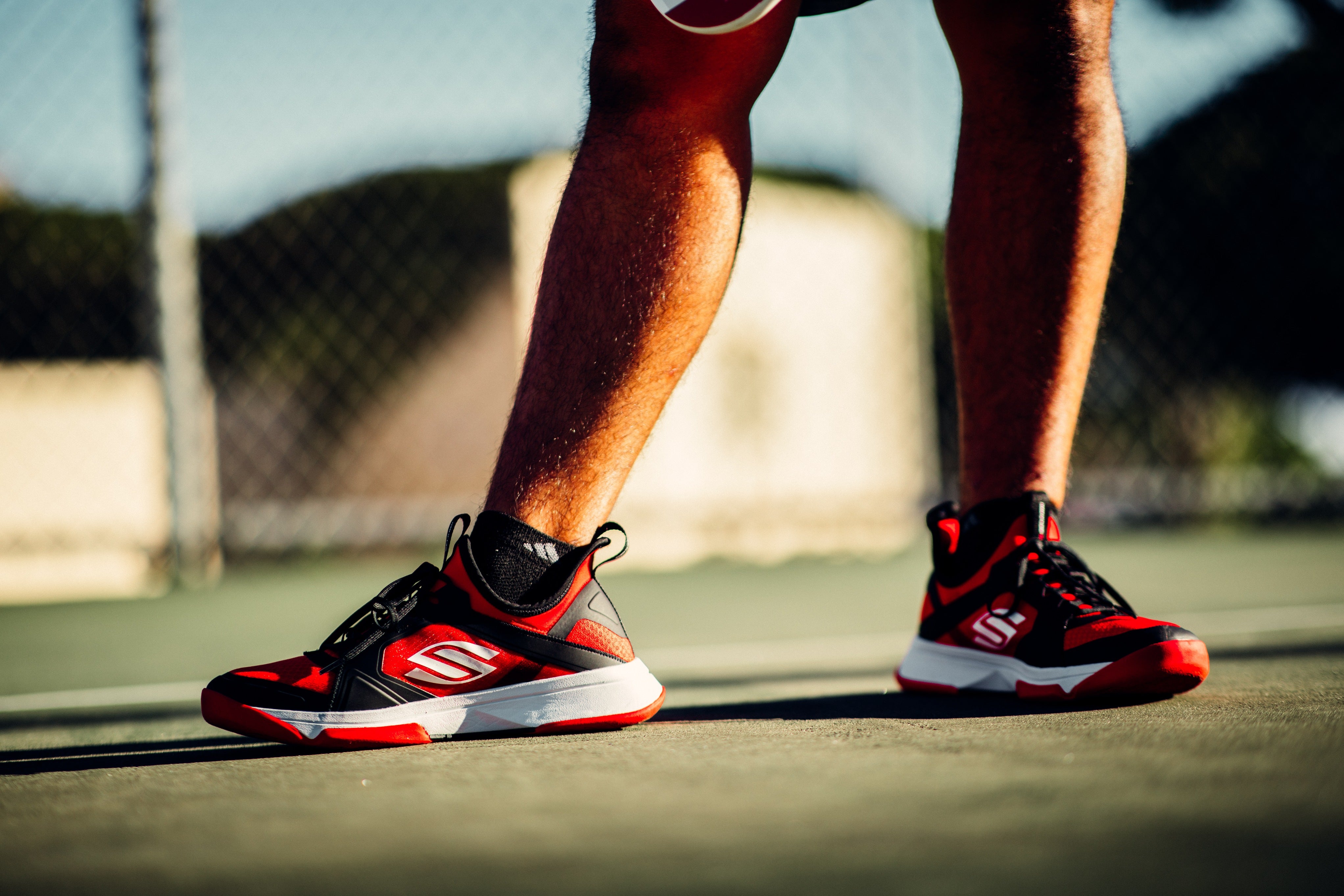 Although many pickleball players start out playing with their normal athletic shoes, you will want to look at pickleball-specific shoes as you get more into the game. But how should your pickleball shoes fit and what else should you look for?