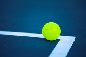 Ball on court: Pickleball rule or just good etiquette? Featured Image