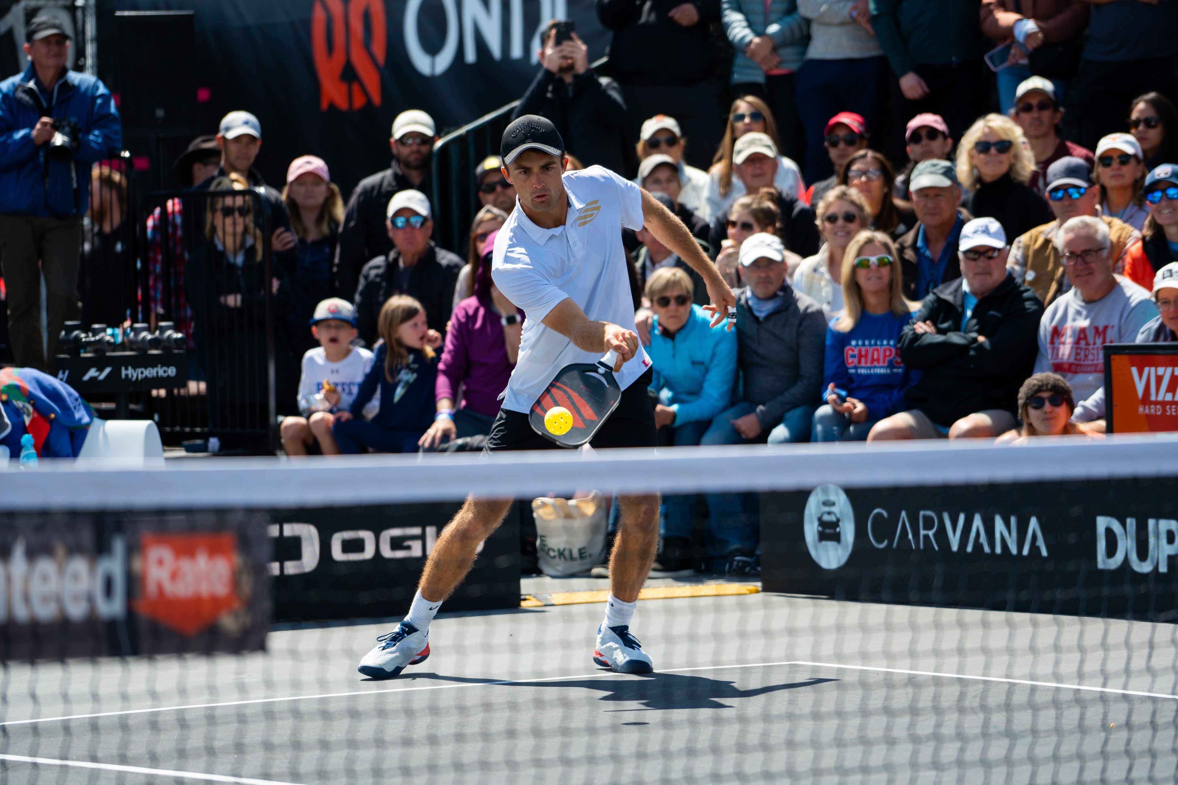 James Ignatowich hits a third shot drop during a professional tournament. 