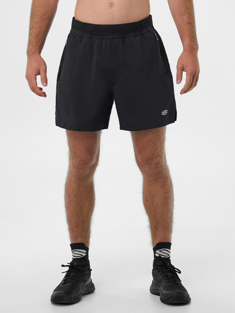 Selkirk pickleball men's shorts in black, white, tan, and grey.