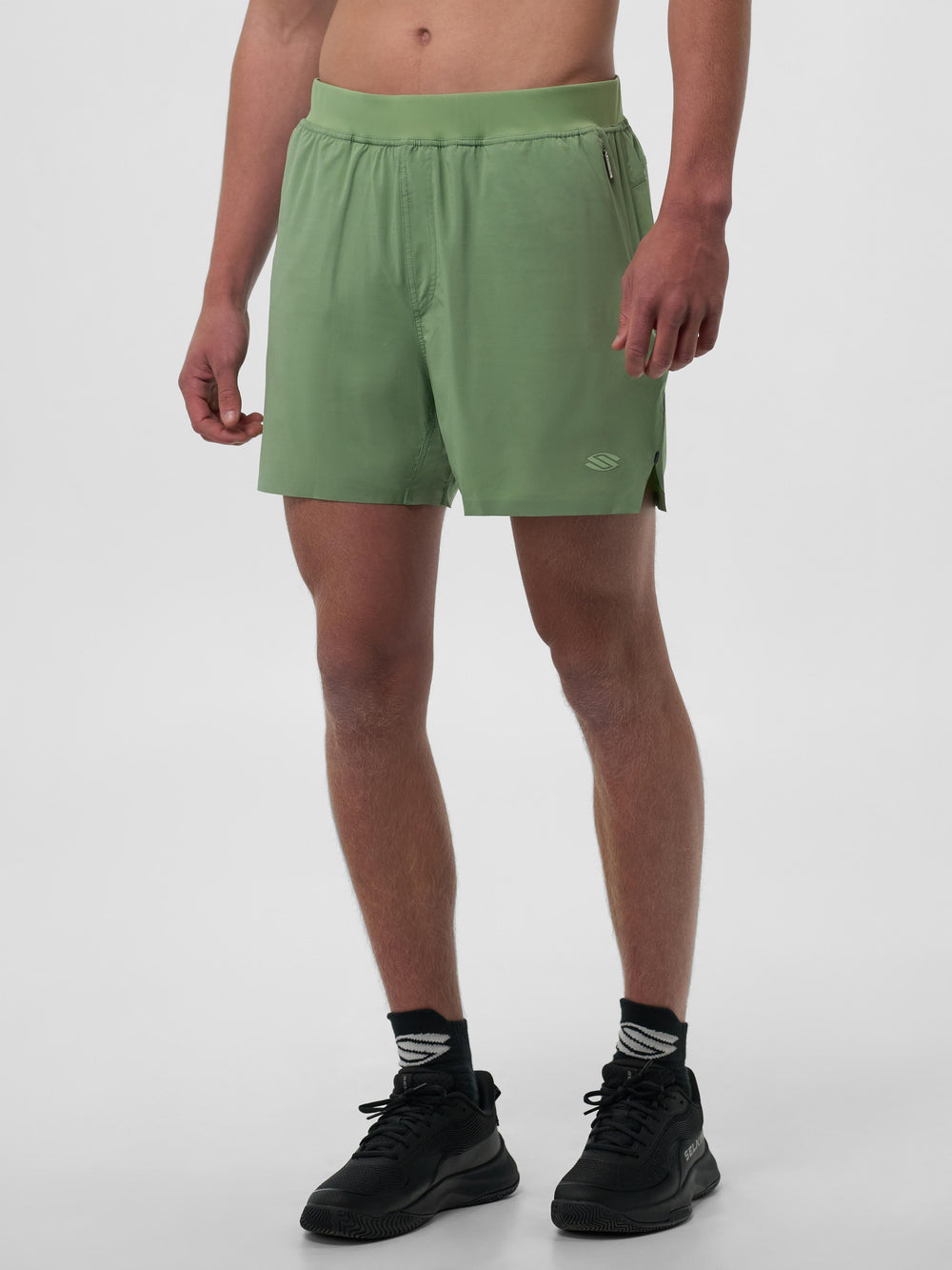 Selkirk pickleball men's shorts in black, white, tan, and grey.