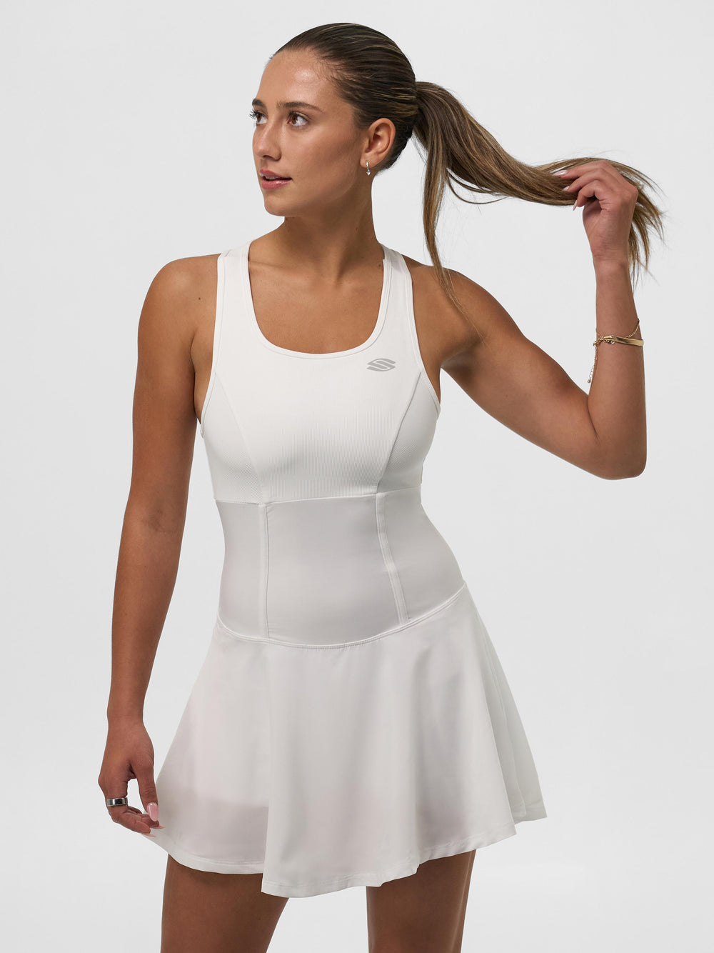 White women's dress with a flared skirt and racerback design.